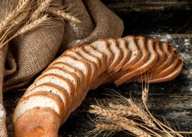 white-bread-sliced-white-bread-with-wheat-flour-table_140725-10851
